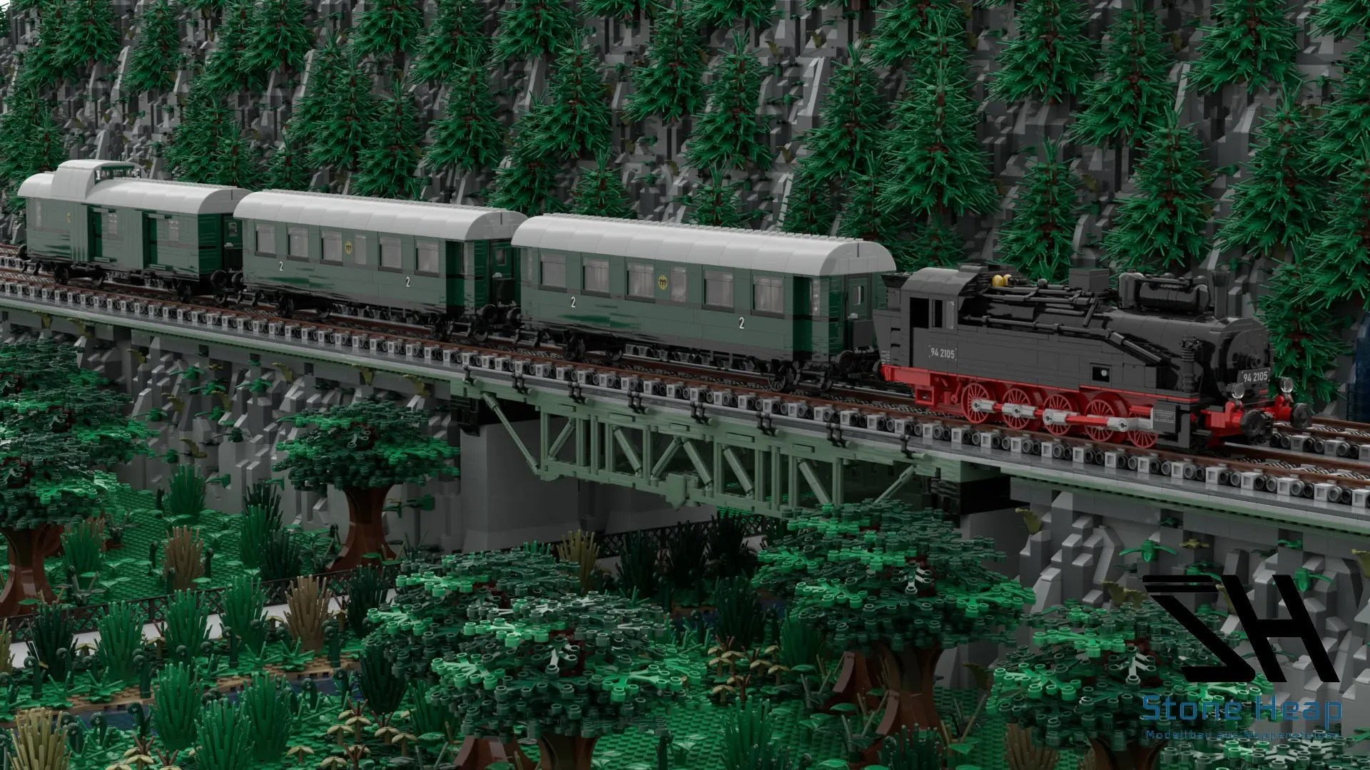 wasserfall-mit-bruecke-und-fluss_dampflokalt-www-stone-heap-com